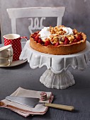 Strawberry cake with cream and crumbles
