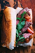 Saddle of venison with rhubarb chutney on a baguette