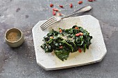 Vegan spinach with goji berries, mirin and sesame seeds