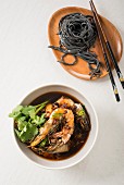 Tsukemen ramen with prawns and black noodles
