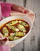 Spicy courgette rolls in tomato sauce