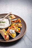 Tacos with prawns, chilli and mango served with coriander yoghurt