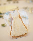 Iced, wedding-dress biscuit as wedding favour