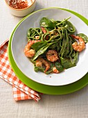 Grass green pasta with spinach and prawns