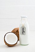 Coconut milk in a glass bottle with a label