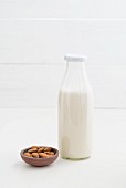 Almond milk in a glass bottle