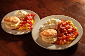 Scrambled eggs with bacon, American biscuits and grits