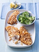 Rosefish fillets with an egg and almond crust