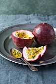 Passion fruits on a pewter plate