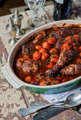 Coq au vin with cherry tomatoes
