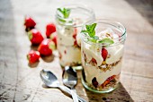 Layered yoghurt muesli with strawberries