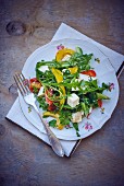 Rocket salad with goat's cheese and peppers