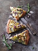 Vegetarian potato pizza with red onions, feta cheese and rosemary