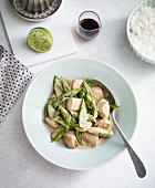Stir-fried chicken and coconut with mange tout and green asparagus