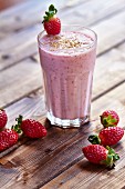 Strawberry smoothie with kefir and sesame seeds