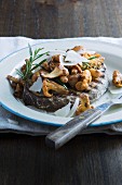 Toast topped with chanterelle mushrooms, Parmesan cheese and rosemary