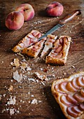 Peach tart on a chopping board