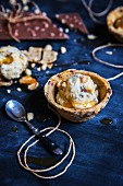 White chocolate ice cream in chocolate chip cookie bowls