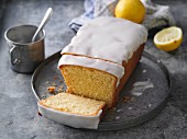 Classic lemon cake with icing, sliced