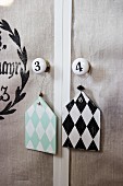 Diamond-patterned shabby-chic pendants hung on furniture knobs