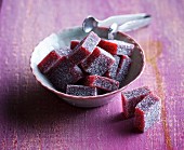 Sour cherry jelly cubes in sugar