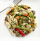 Chicken curry salad with peppers and mushrooms