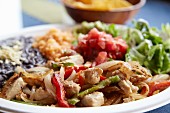 Vegan fajitas with vegetables and rice (Mexico)