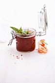 Oven-baked tomato and chilli verrine with basil butter crostini