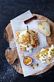 Waffles with poached pears, yoghurt and passion fruit