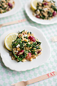 Quinoa salad with kale, red grapes and feta cheese