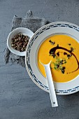 Pumpkin soup with crunchies and pumpkin seed oil