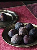 Fresh red figs on a pewter plate