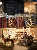 Various chocolate stars in storage jars