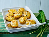 Stuffed spring potatoes with melted cheese