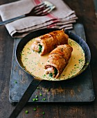 Stuffed veal roulade with a white wine sauce