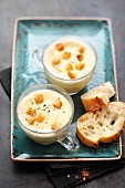 Sparkling Prosecco foam soup with croutons