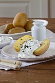 Boiled potatoes (cooked in their skins) with herb quark