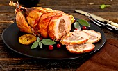 Roast pheasant with a ham and apple stuffing