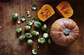 A pumpkin and Brussels sprouts