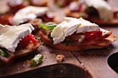 Grilled bread topped with brie and spicy dates