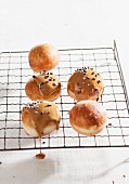 Mini doughnuts with coffee glaze on a wire rack