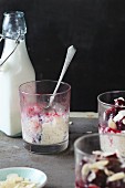 Half eaten rice pudding with cherries and flaked almonds