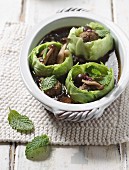 Cabbages filled with wild mushrooms and meatballs