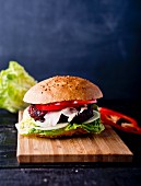A beetroot burger with peppers
