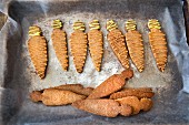 Carrot-shaped digestive biscuits for Easter