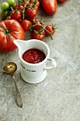 Homemade tomato ketchup in a porcelain jug