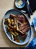 Ribeye steak with roasted parsnips, anchovies and horseradish
