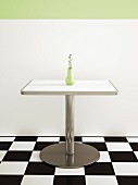 American-style café: metal table on chequered floor