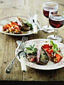 Beef steak with herb butter and a red pepper medley