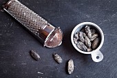 Tonka beans with grater